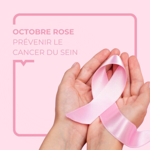 Main tenant un ruban rose
